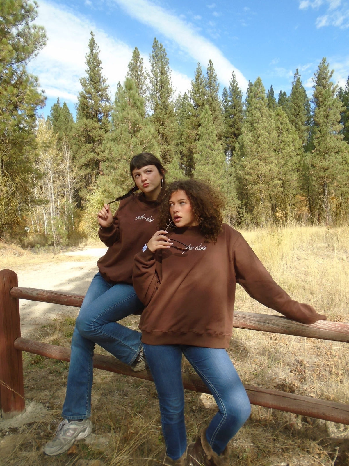 Friends in Mocknecks outside on a fence